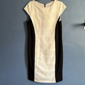 STUDIO ONE SLEEVELESS WHITE AND BLACK DRESS WITH ZIPPER CLOSURE. Nicely made!